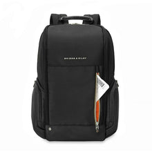 Load image into Gallery viewer, Briggs &amp; Riley HTA Medium Wide Mouth Backpack - front stash pocket

