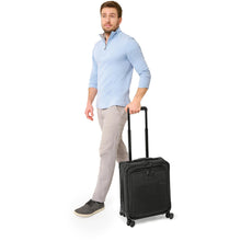 Load image into Gallery viewer, Briggs &amp; Riley Baseline Compact Carry On Spinner - lifestyle wheeling
